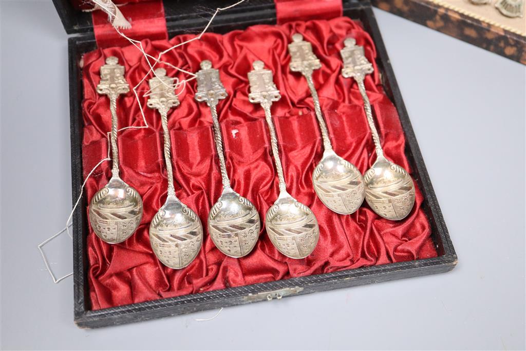 A cased set of silver teaspoons, a set of continental white metal cake forks and sundry mainly silver flatware.
